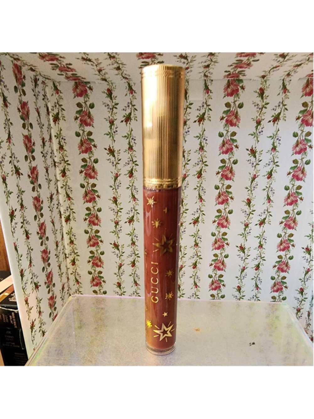 Gucci lip gloss in brown with gold stars #luxury #lipgloss